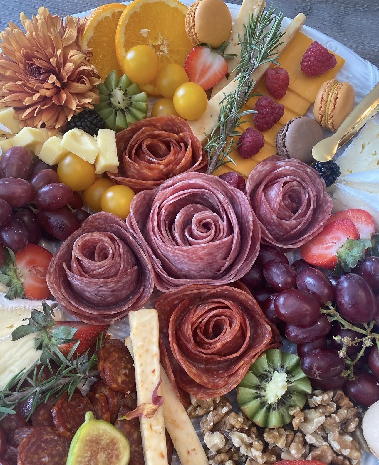 Stunning salami roses with cheese and fruit board
